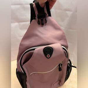 Lavender shoulder sling sporty style bag.